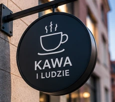 Szyld elewacyjny zamontowany na budynku